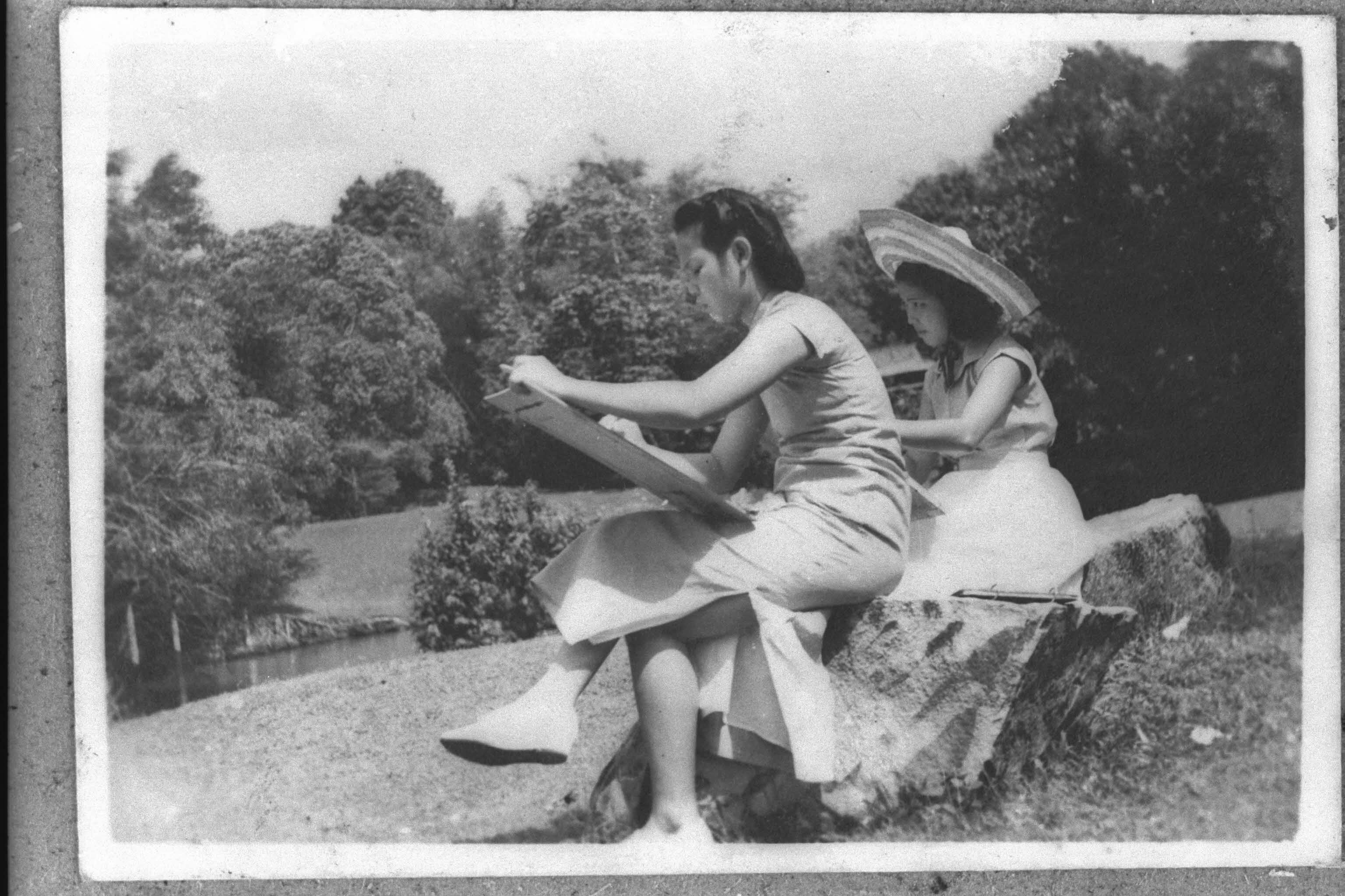 An artist and her daughter sketching the scenery of Alkaff Lake Gardens, 1930